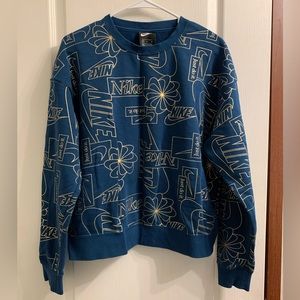 Teal NIKE sweatshirt with gold accents size M